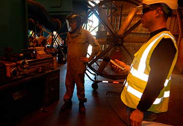 Certified Industrial Hygienist (CIH) evaluating noise impact in a worker in a factory in Okinawa, Japan