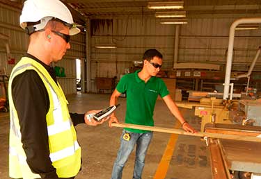 Certified Industrial Hygienist (CIH) evaluating noise impact in a worker on a lawn mower in Okinawa, Japan