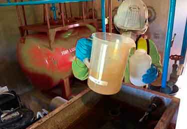 Environmental Engineer sampling PFOS at a military facility in Okinawa, Japan